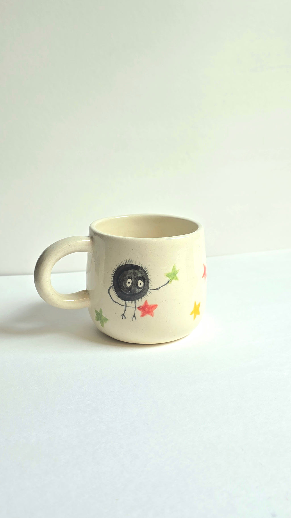 handmade ceramic ghibli inspired mugs with totoro and soots and perfect for collectors