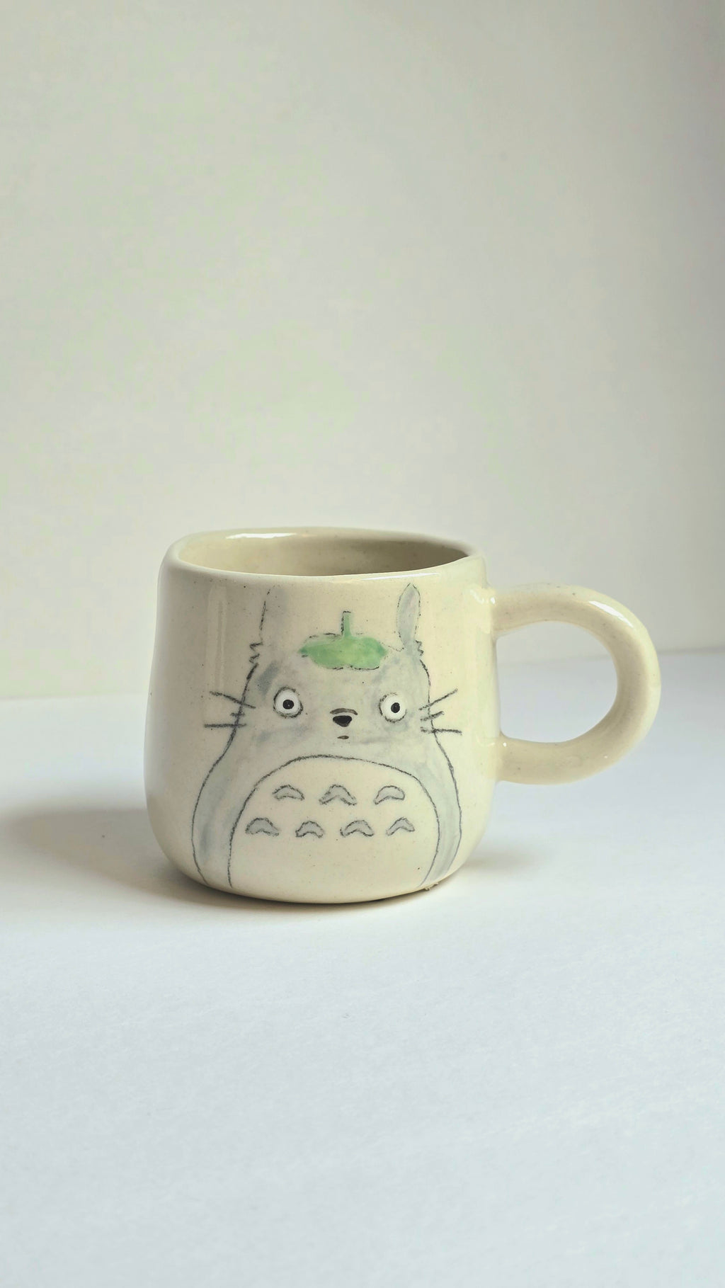 Mug with a cartoon character on a white background
