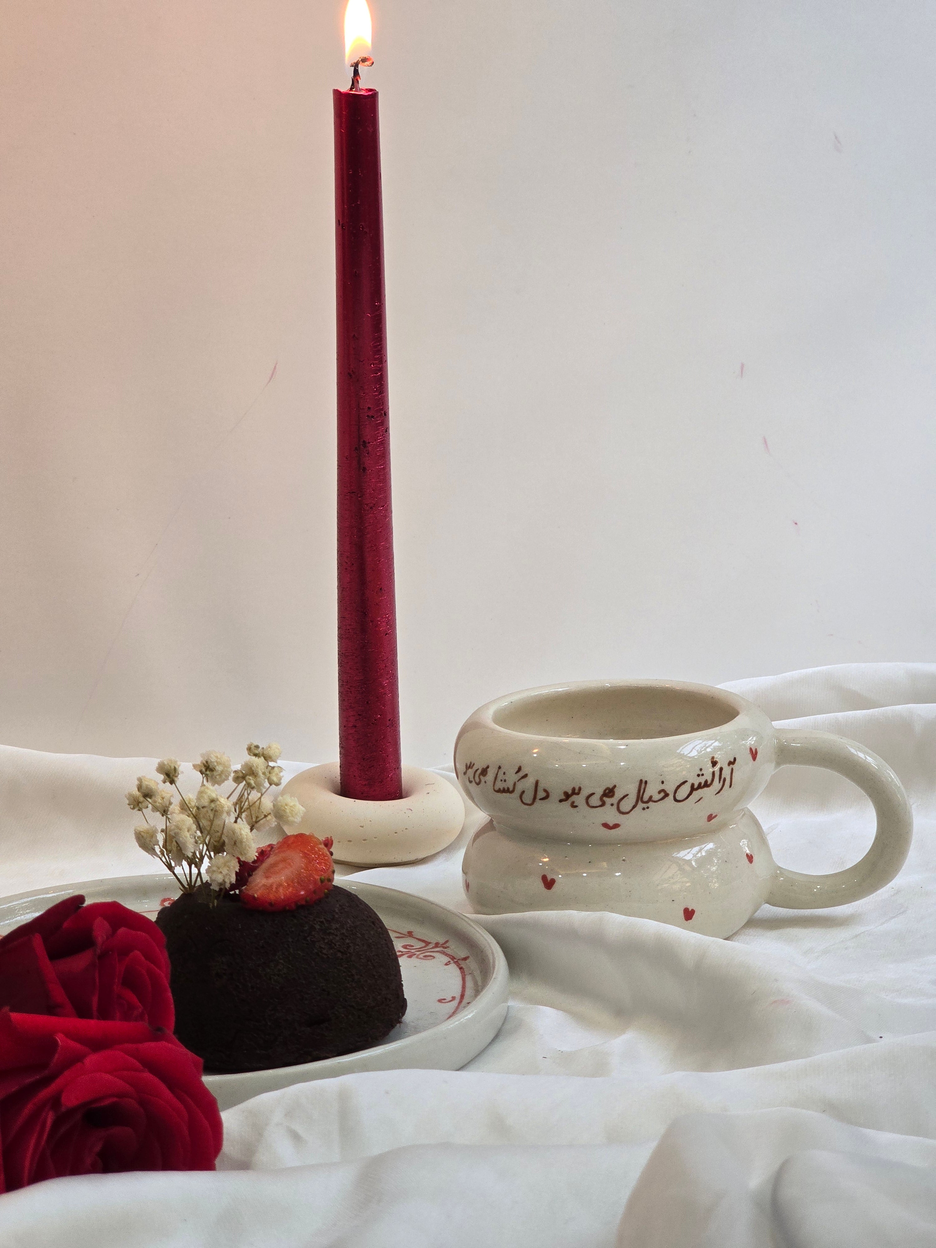 handmade and handpainted ceramic mug with urdu song and poetry perfect for gifting on valentines day and other occasions made by pastel jade ceramic studio in pakistan it is oven safe and foodgrade fired at high temperature in gas furnace made with stoneware clay and leadfree glaze